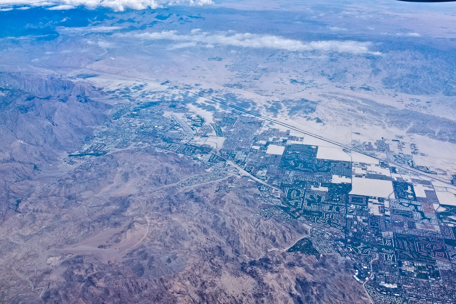 Regional aerial view including Cathedral City, Palm Springs and Thousand Palms.