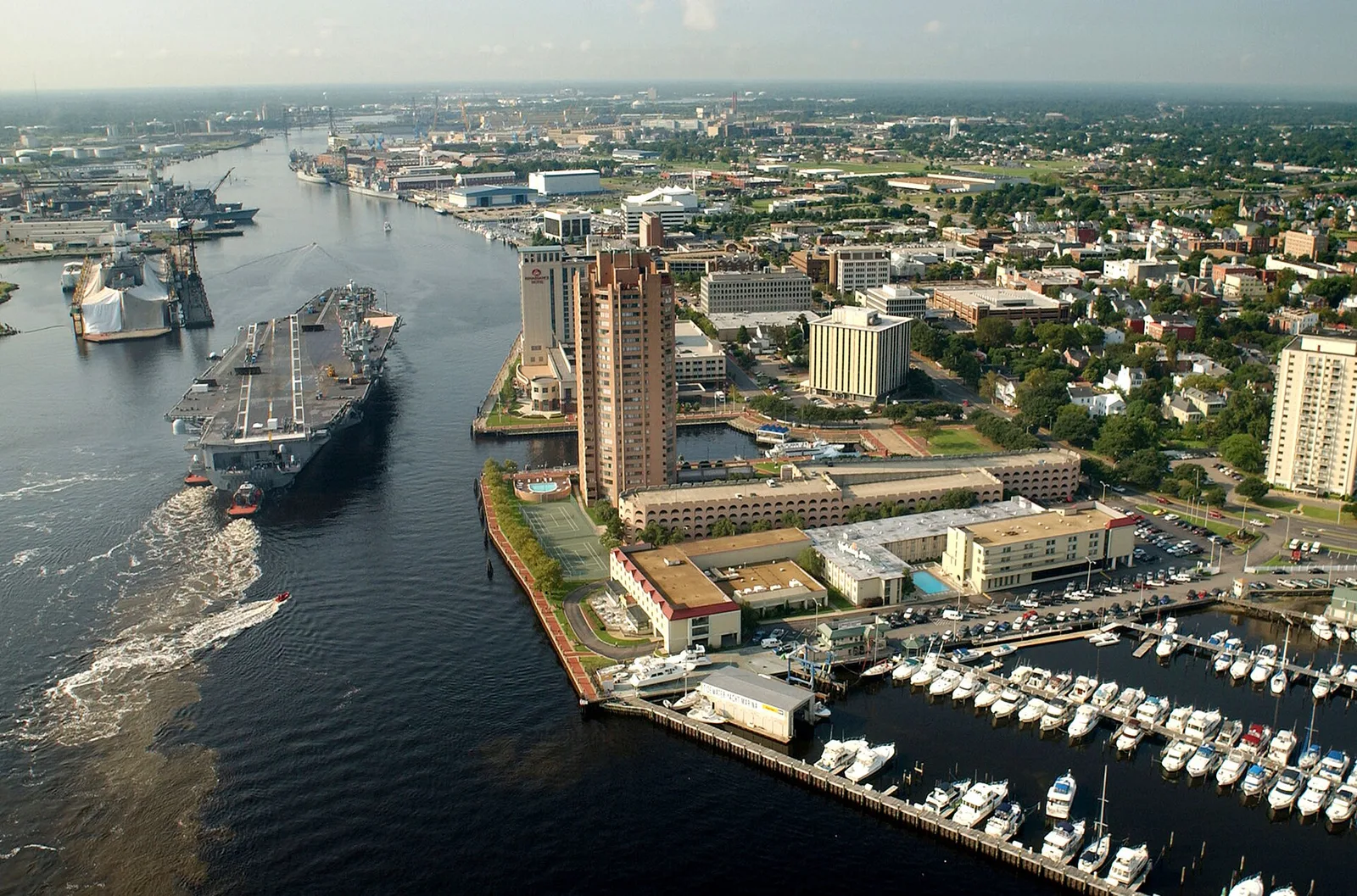 Portsmouth, Virginia: US Navy 030820-N-9851B-011 Tug boats guide USS Harry S. Truman (CVN 75) up the Elizabeth River, past Portsmouth landmarks